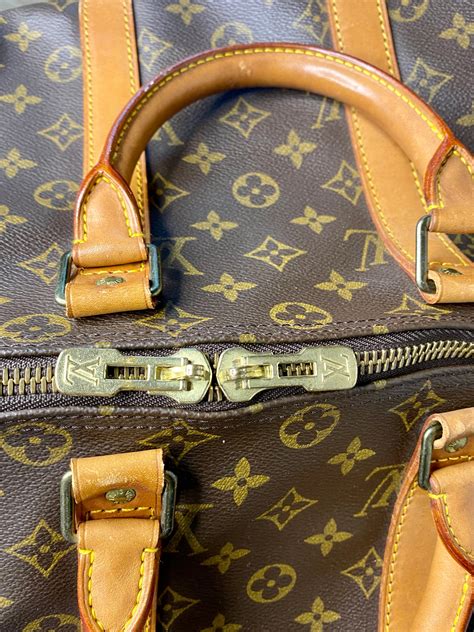 louis vuitton vintage slotje